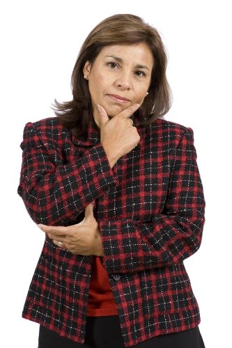 Waist up portrait of a beautiful mature hispanic business woman with thoughtful expression. Isolated on a pure white background.